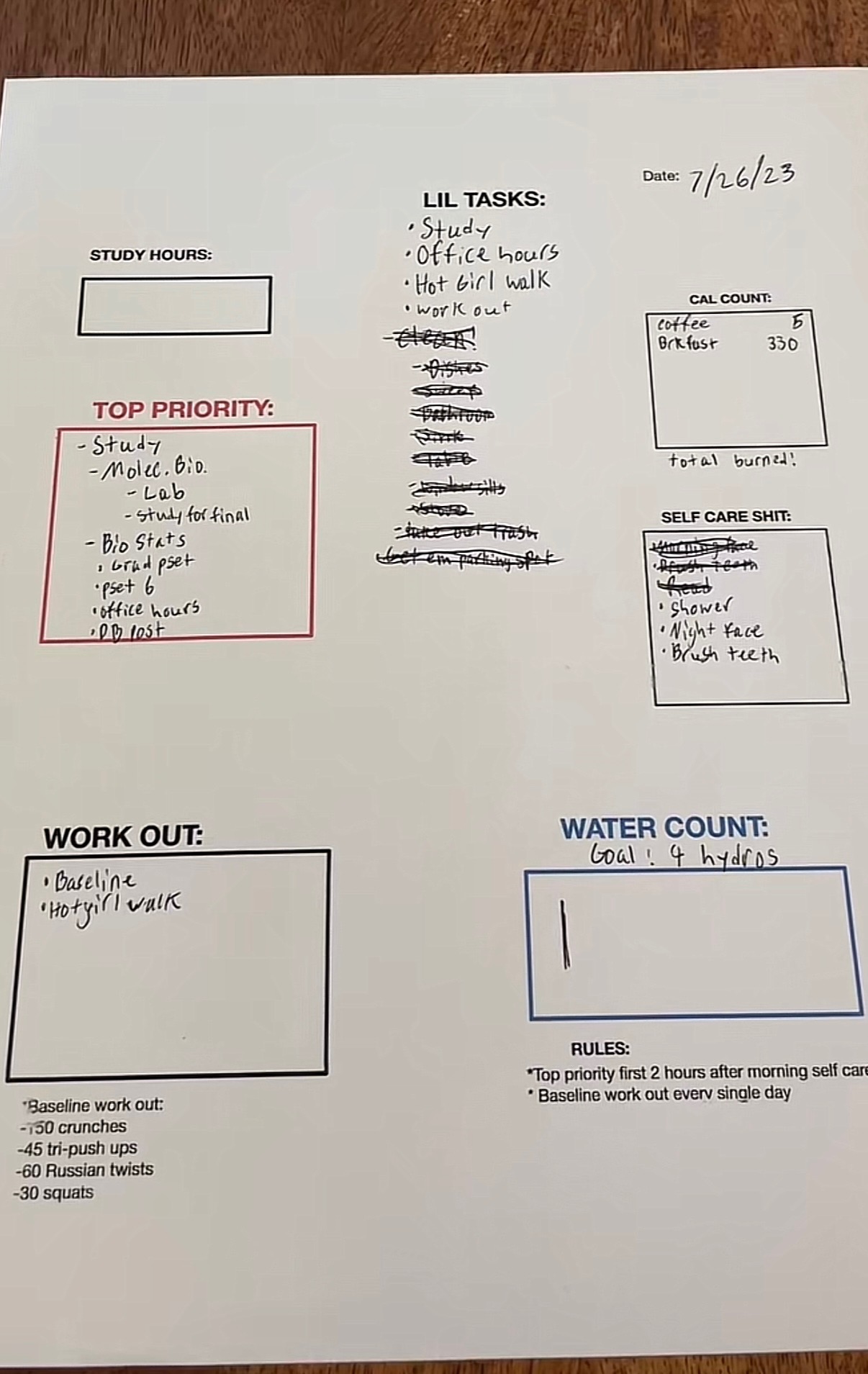 An early handwritten Daily Grind worksheet dated July 26, 2023, with study hours, Top Priority, small tasks, self-care, exercise, and water sections